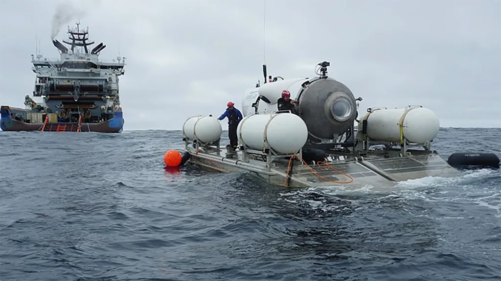 OceanGate tows its Titan submersible out from the company&rsquo;s home base in Everett, Wash., for a test in Puget Sound in preparation for its first Titanic dive in 2021. (OceanGate Photo)